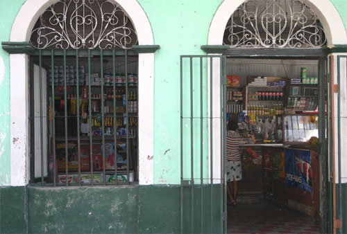 a small neighborhood store or 'pulperia'